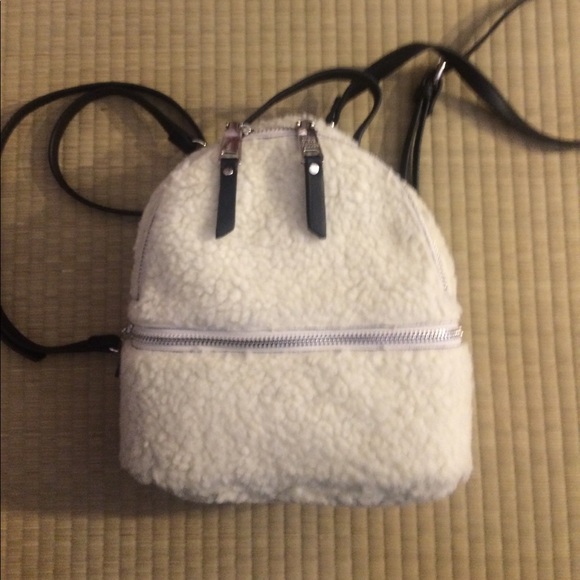 white fuzzy backpack